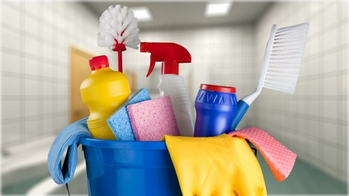 Crayford Carpet Cleaners staff sorting recyclable cleaning materials in a sustainable operations setting